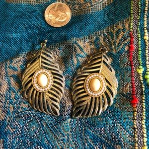 Statement feather earrings